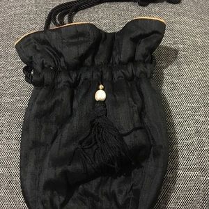 NWOT Silk Black drawstring bag w/tassel.